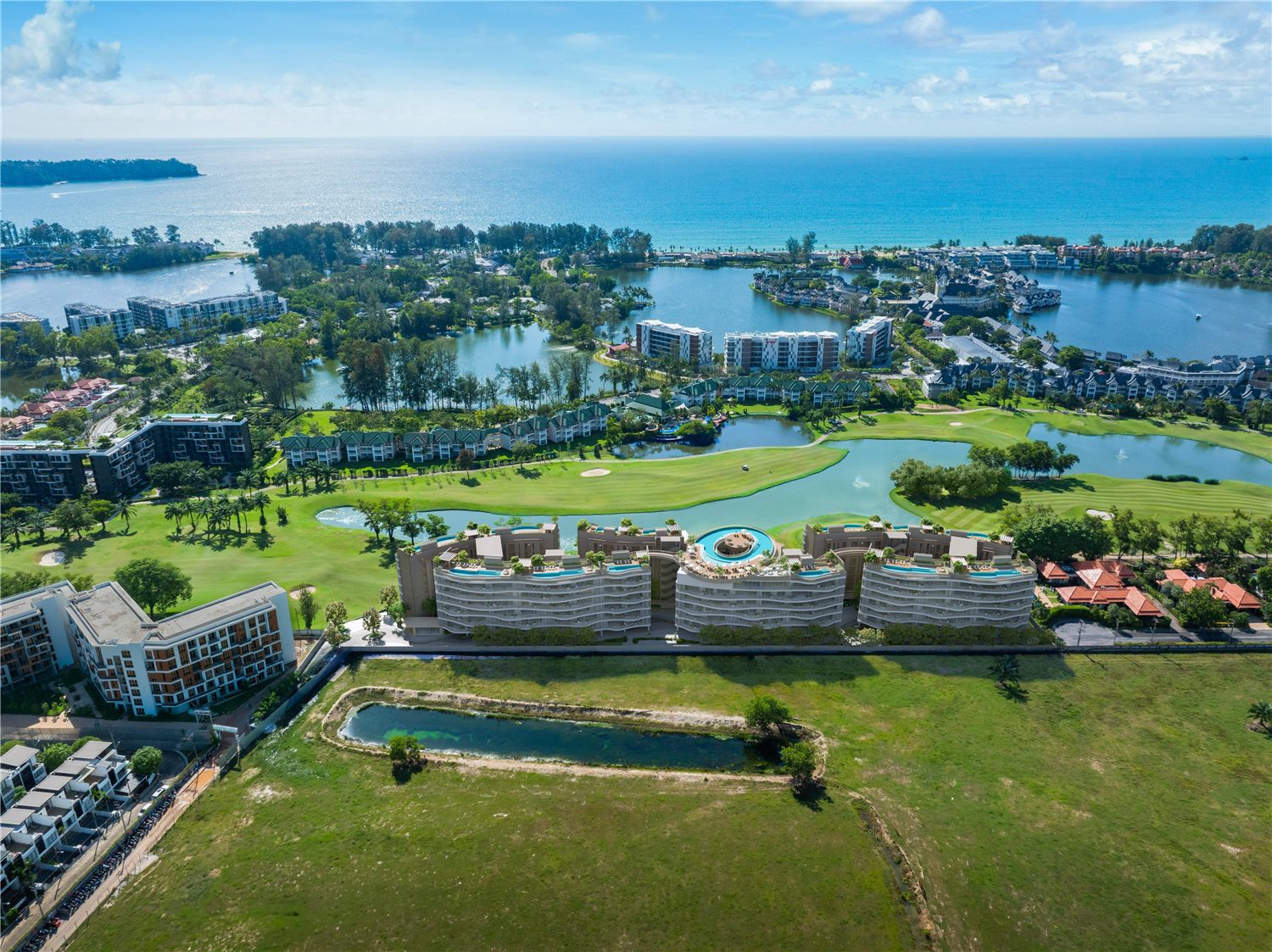 Topaz low-rise buildings and Laguna Phuket landscape
