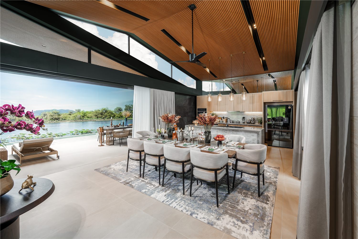 Open-plan living area of waterfront villa